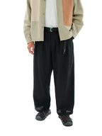 PLEATED TROUSERS